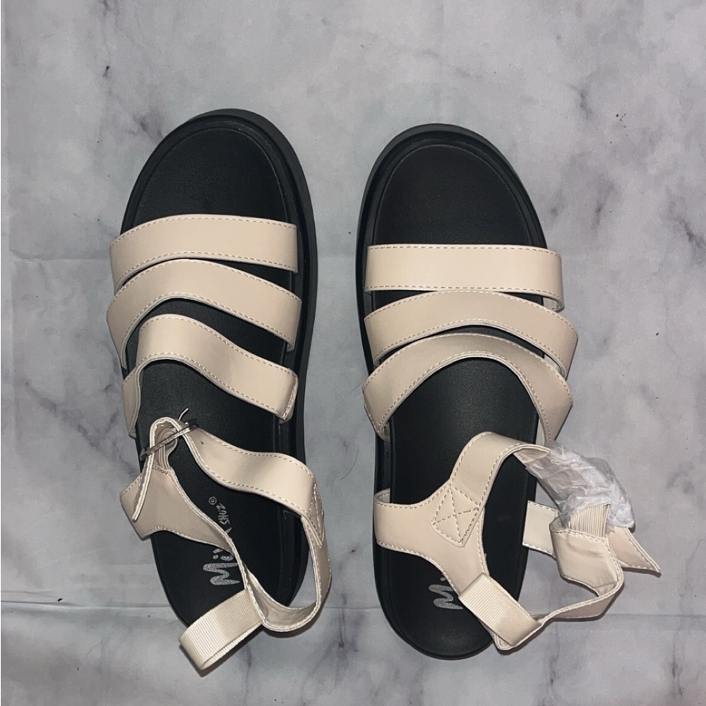 Stylish Cream Sandals with Black Soles